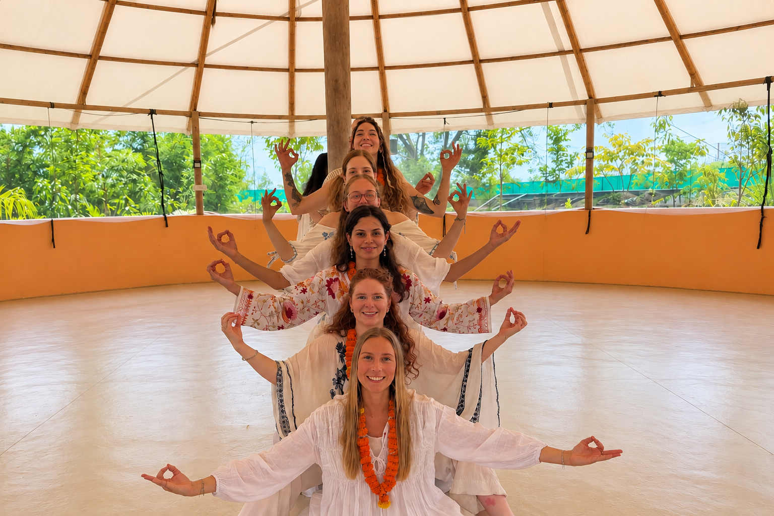 Group pose in the dome yoga hall
